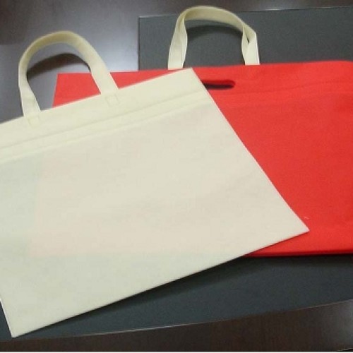 Non woven fabric flat bag with handle attachment